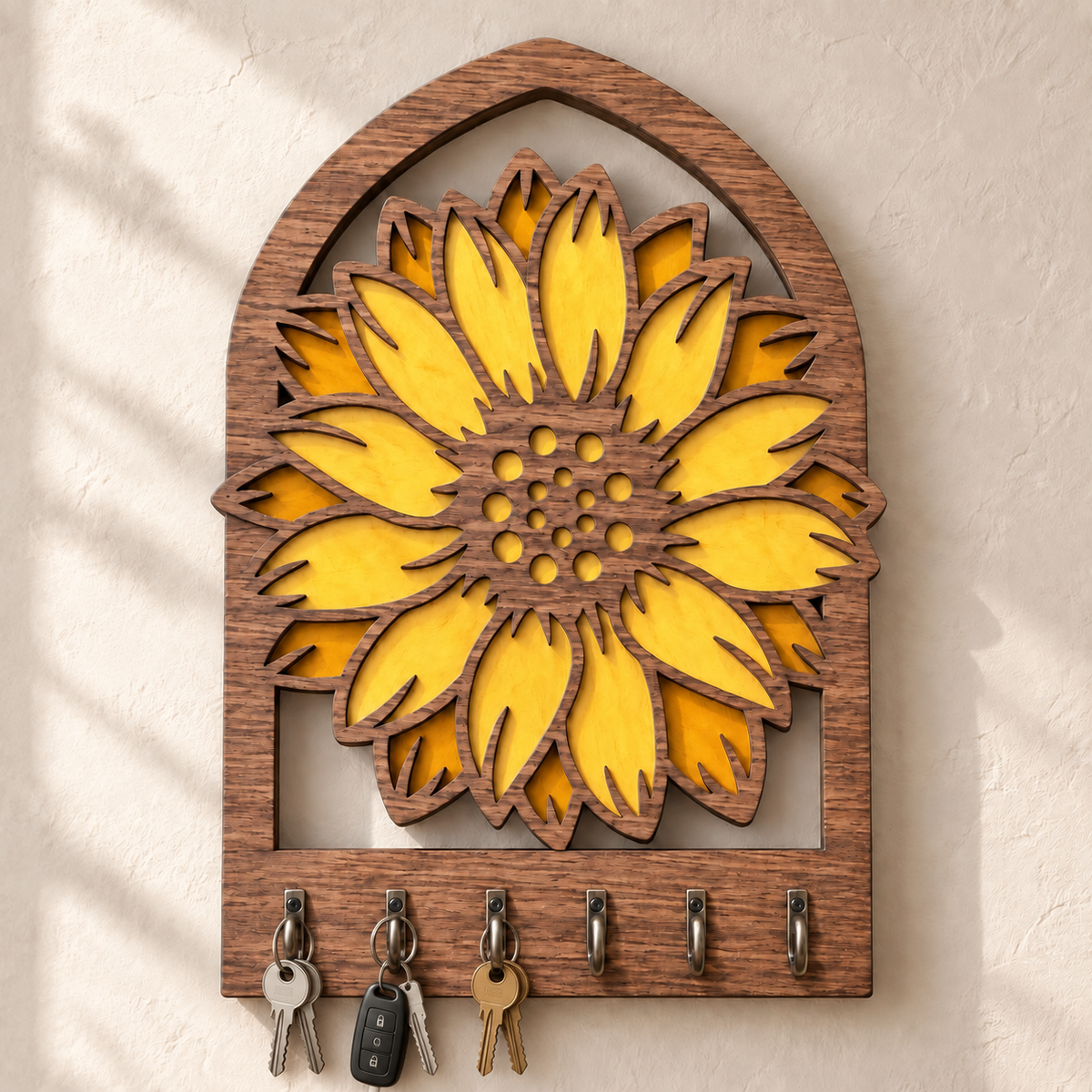 Sunflower wooden key rack shown holding several sets of keys