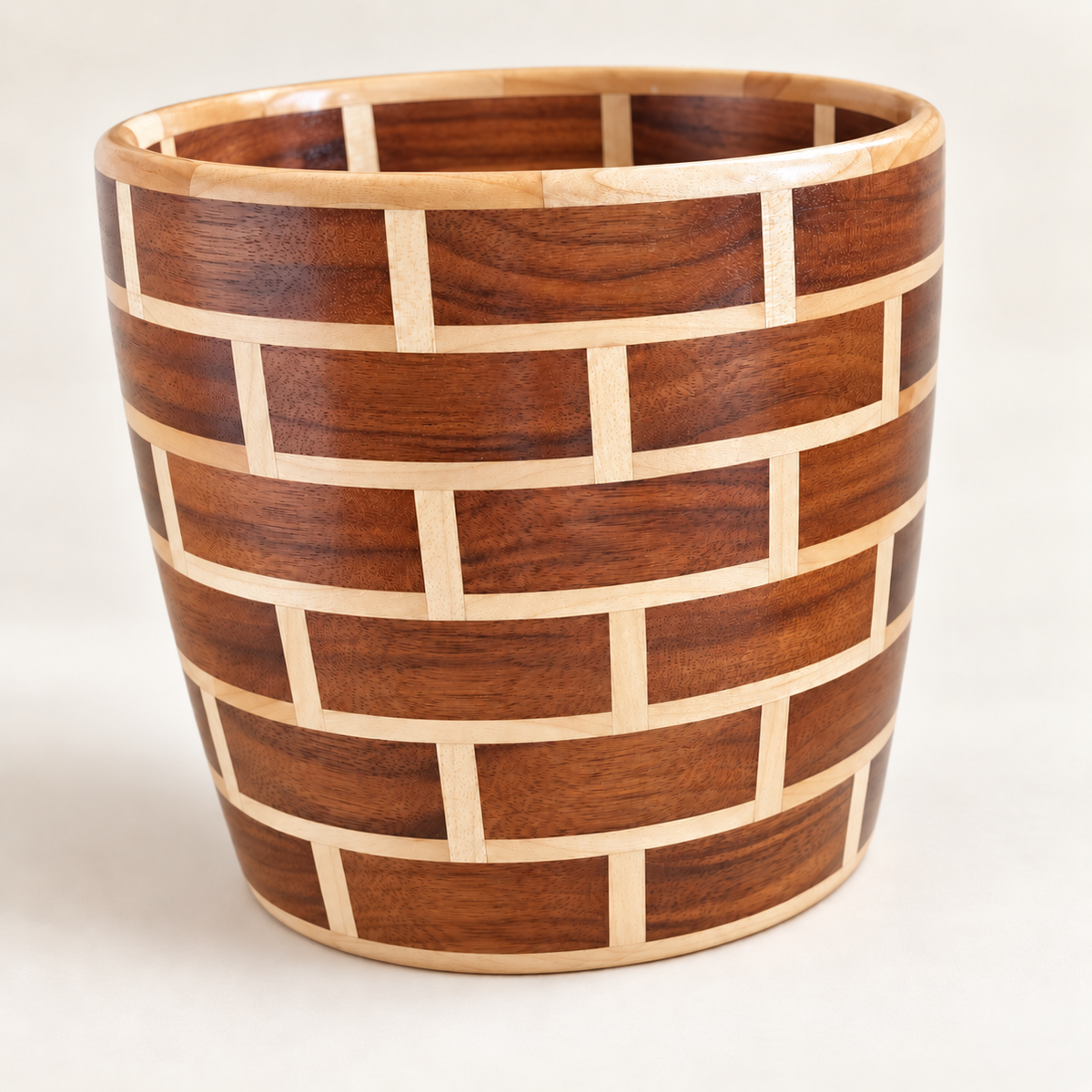 Walnut and maple brick-pattern vase with balanced warm walnut coloration